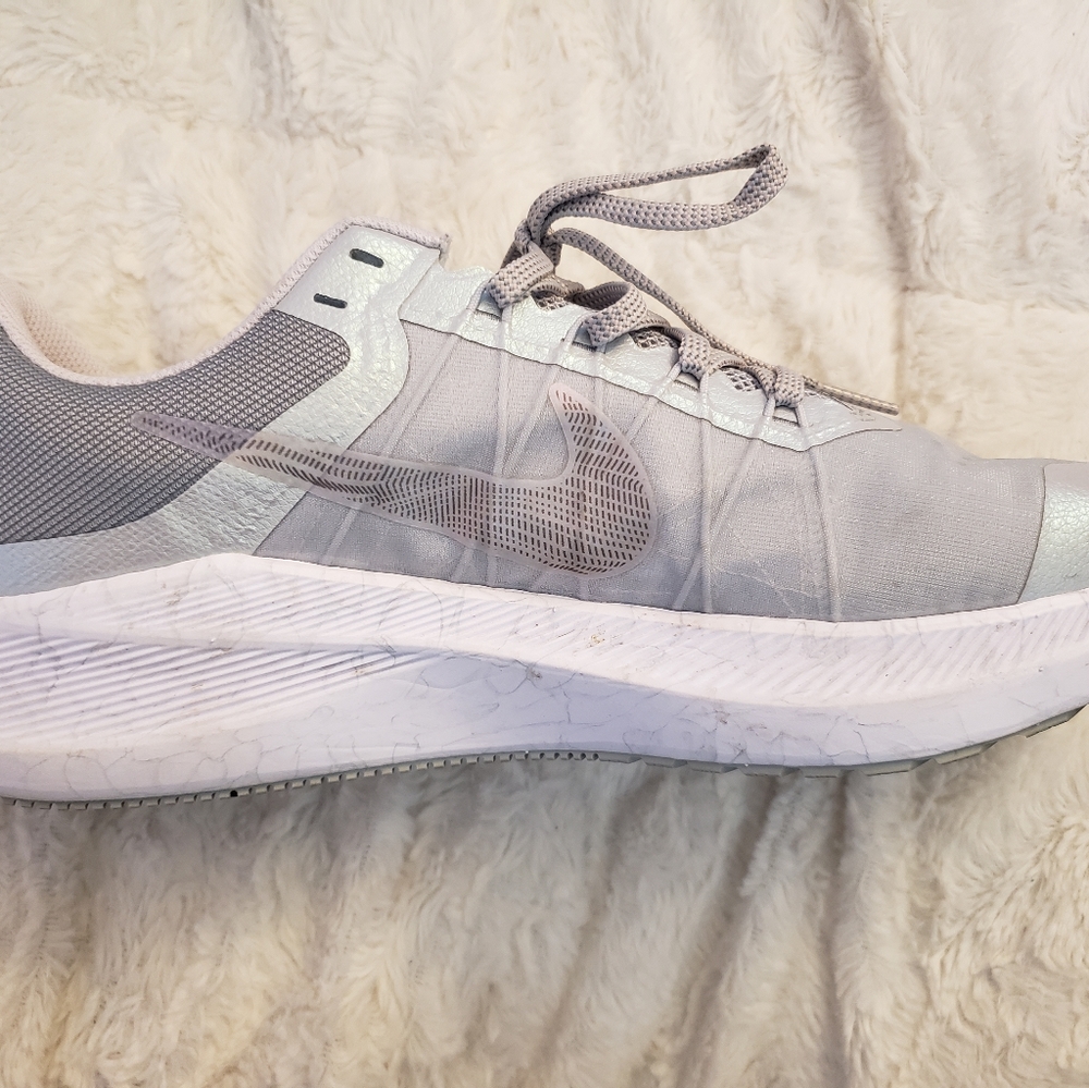Nike women's size 11,color has a slight iridescent look,like new,only worn twice